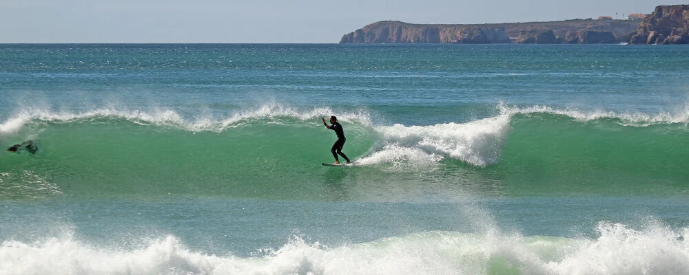 Surfing the best waves of Sagres in Zavial
